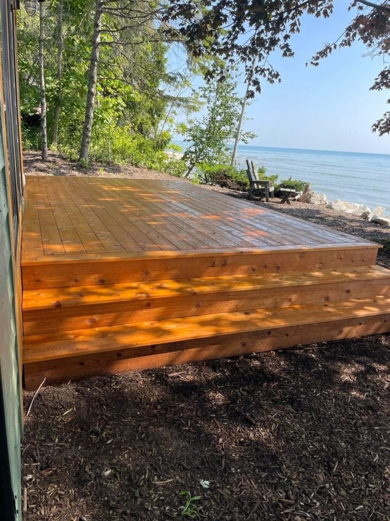 Wooden deck, outdoor painting, lake view, natural setting, Hi-Tech Painting and Decorating.